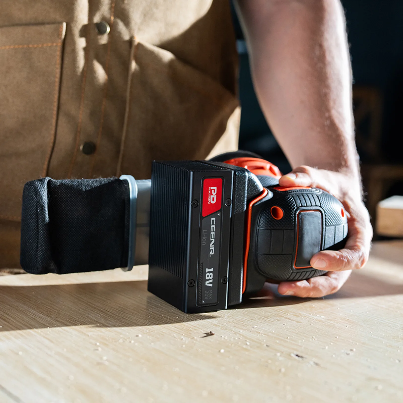 CEENR PDnation Mini 4.0Ah universal battery powering a cordless angle grinder